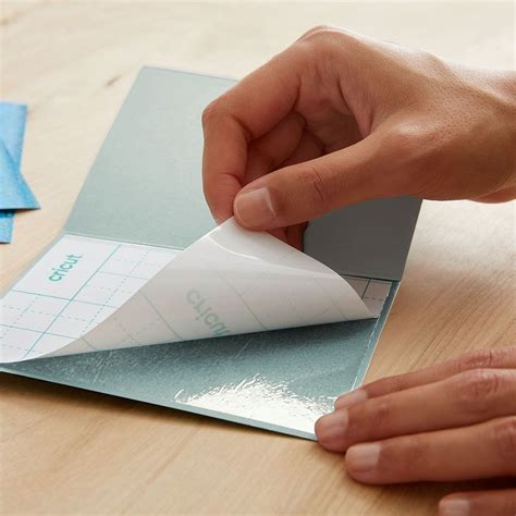 2008856 - Cricut Joy Cut Away Card Pastel Sampler; 8 cards with adhesive (3 Tulip, 3 Powder Blue, 2 Whispering Blue); 8 Silver Matte Holographic backers; 8 White envelopes; Dimensions: Cards 4.25 in x 5.5 in (10.8 cm x 14 cm), Backers 4.1 in x 5.3 in (10.4 cm x 13.6 cm), Envelopes 4.37 in x 5.75 in (11 cm x 14.6 cm); Create stunning custom cards in minutes; Easy to cut with specialized Cricut Joy™ Card Mat (sold separately); For Cricut Joy™